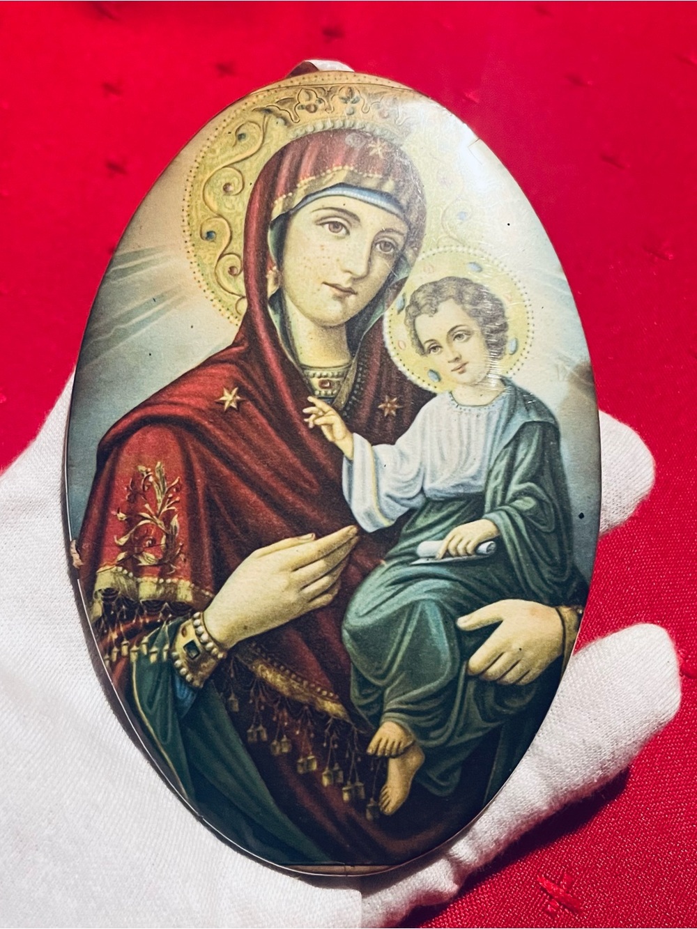 Vintage Eastern Orthodox icon depicting the Virgin Mary holding the Child Jesus